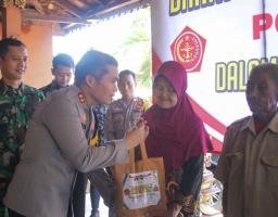 Polres Nganjuk bersama Kodim 0810/Nganjuk Gelar Bansos dan Pengobatan Gratis bagi Warga Desa Sidokare