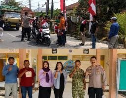 Sambut HUT RI ke-81,Muspika Arosbaya Bagikan Bendera Merah Putih kepada Pengguna Jalan